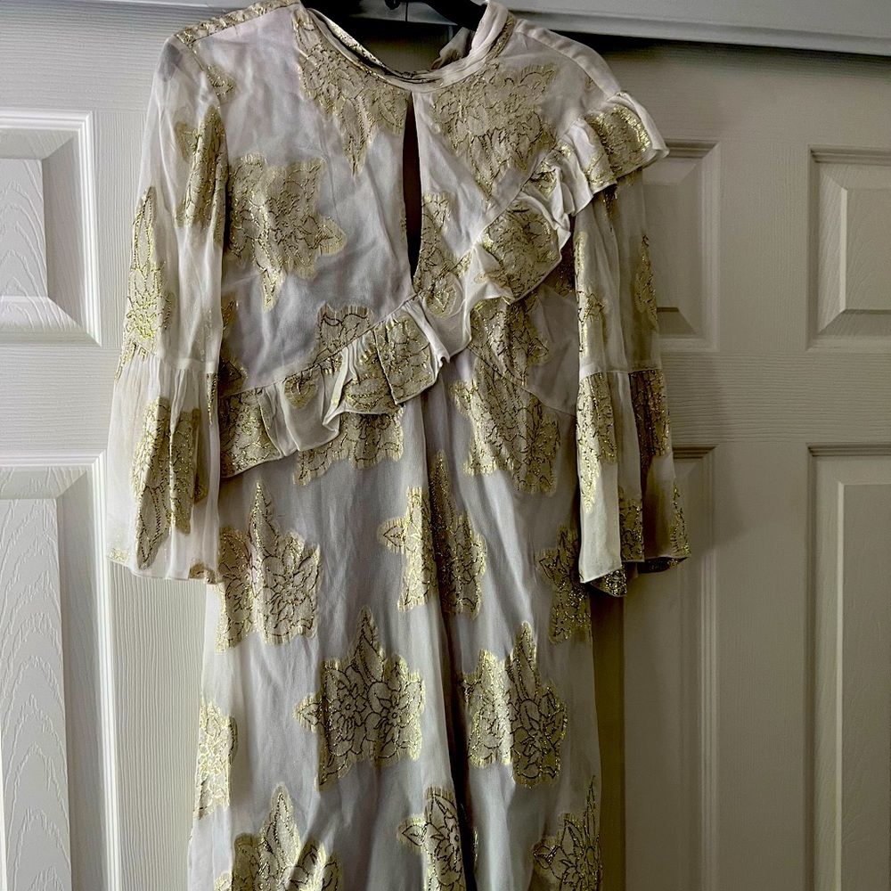 Beautiful brand new designer dress new with tickets! Comes with slip underneath